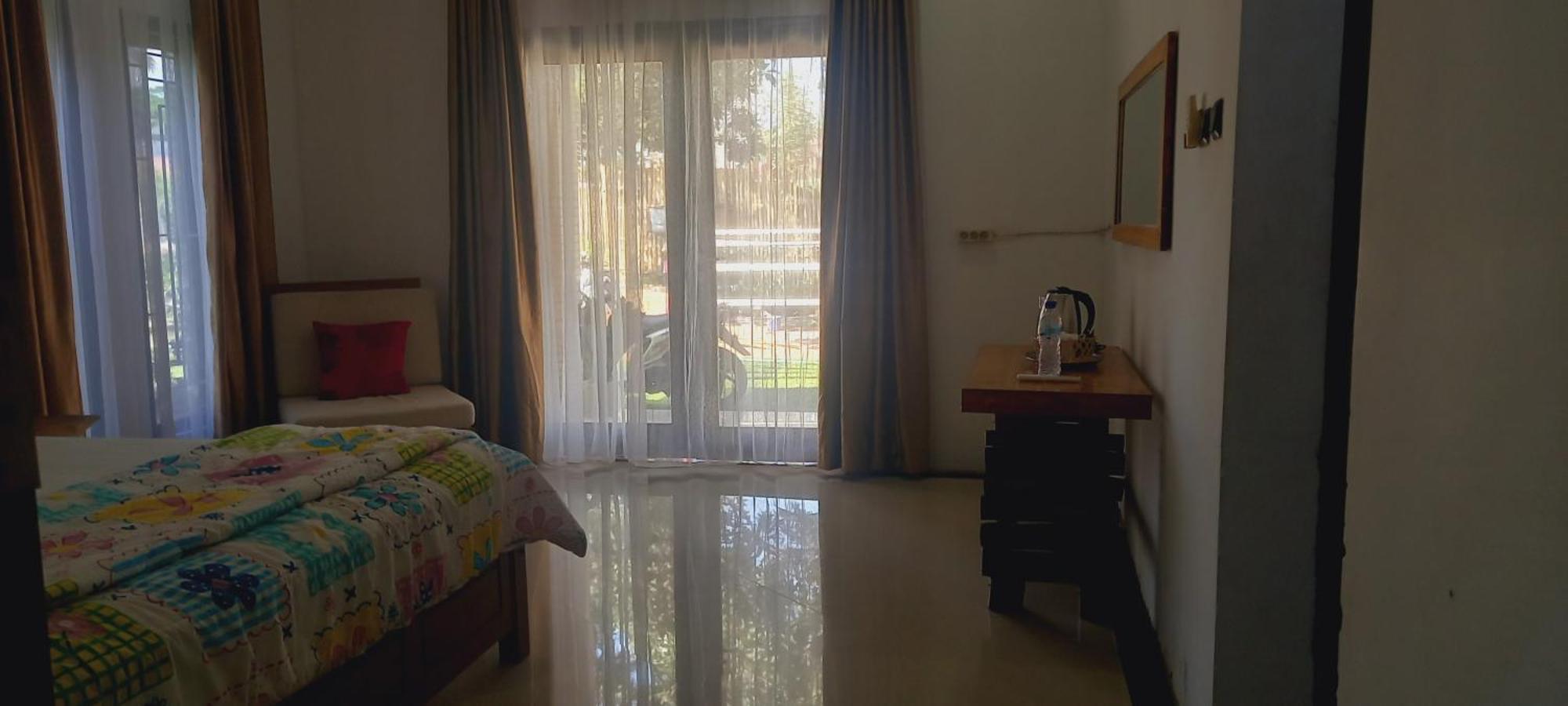 Inang Amang Homestay Labuan Bajo Pokoj fotografie